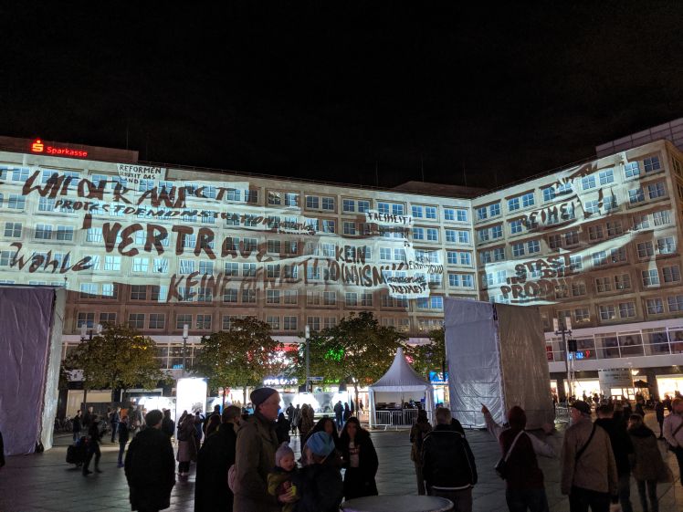Projected video on the buildings surrounding Alexanderplatz