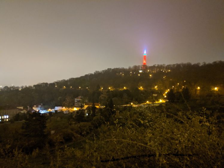 The Petřín Tower at night.