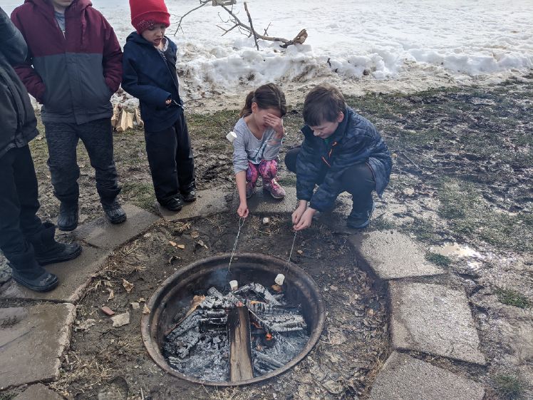 The fire pit was surrounded by mud, but that didn't stop the boys from getting seconds!