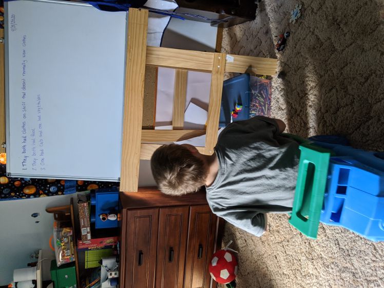 Owen sitting on his learning throne.